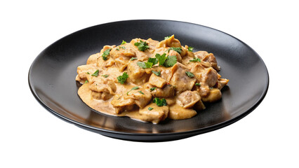 Chicken stroganoff with mushroom sauce on black plate isolated on transparent background
