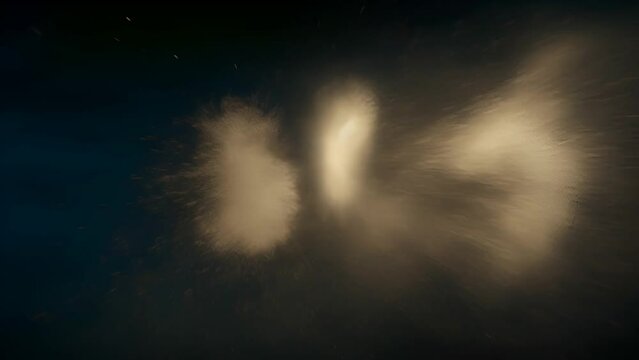 grey powder exploding towards the camera, black background enhances the visibility and contrast of the grey powder