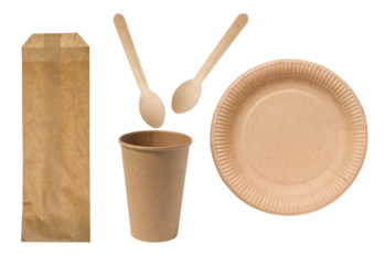 Disposable paper plate, glass and wooden spoons on isolated background.