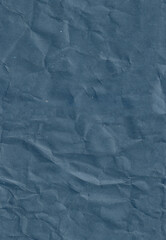 Seamless crumpled craft blue paper texture. Old scrapbook paperboard. Vertical portrait orientation.