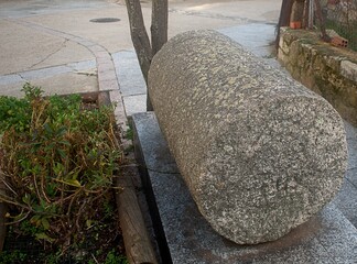 like a millstone