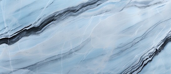 A detailed shot of a frozen slope resembling a blue and white marble pattern created by wind waves in an icy landscape, with hints of electric blue in the ice cap