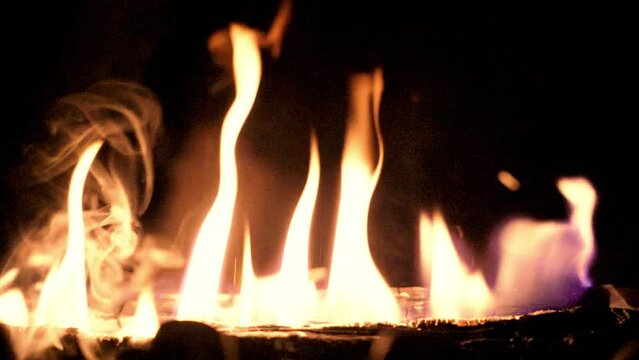 Slow Motion Low buring fire on log in fireplace Haddonfield New Jersey 4k