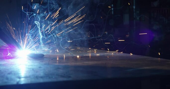 Arc welding close up dark slow motion 2