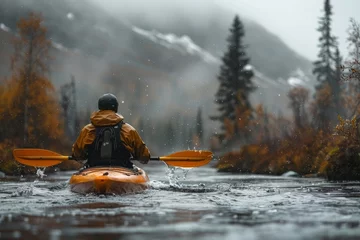 Raamstickers Kayaking down a rapid river in the mountains © FrankBoston