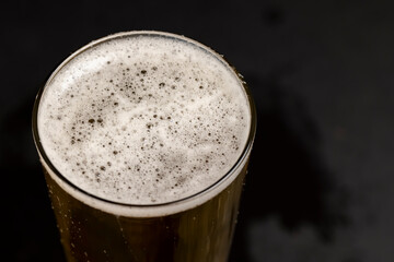 a glass glass with an alcoholic drink in close-up