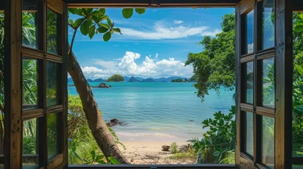 Photo sur Plexiglas Railay Beach, Krabi, Thaïlande View from the house from inside an open window to the beach with blue water, white sand beach, rocks in the background, turquoise sea water, tropical forest, sunny day. View from the window.