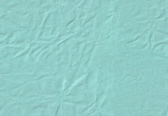 Seamless battered dark sky blue craft paper texture. Recycling beige page.