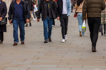 Fototapeta premium people walking on the street