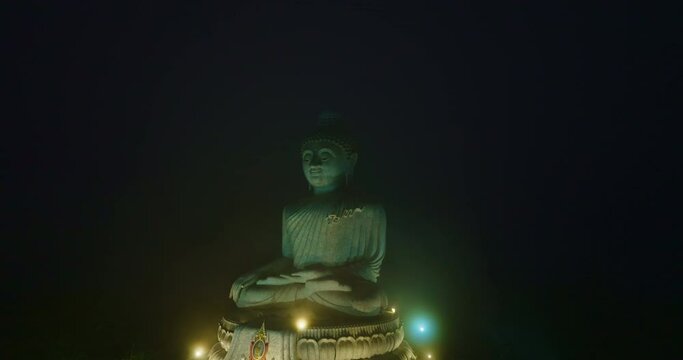 aerial Hyperlapse view around Phuket big Buddha in beautiful twilight..360 degree view on Phuket big Buddha viewpoint..Video clips for travel and religious ideas..smooth cloud in dark sky background
