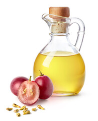 Bottle of grape seed oil and fresh ripe grapes with seeds - 758420744