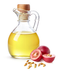 Bottle of grape seed oil and fresh ripe grapes with seeds - 758420760