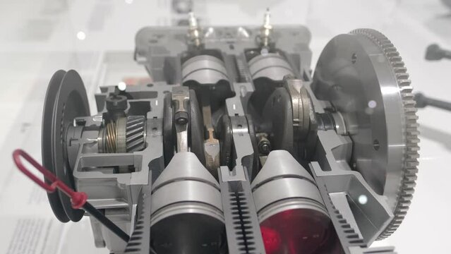 Air-cooled, four-cylinder, flat engine parts move, display, retro-style, automotive passion, history automotive industry show in Stuttgart, Germany