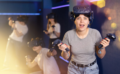 girl is exhilarated by unexpected turn of events in virtual game with friends and budged upwards...