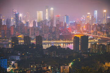 Obraz premium Night view and beautiful skyline of Chongqing urban architecture