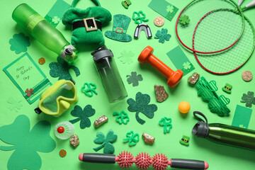 Sports equipment and decorations for St. Patrick's Day celebration on green background