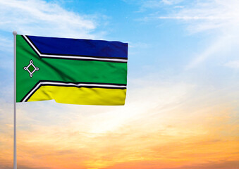 3D illustration of a Amapa flag extended on a flagpole and in the background a beautiful sky with a sunset