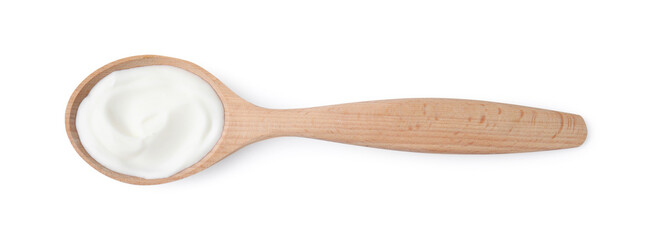 Delicious natural yogurt in wooden spoon isolated on white, top view