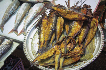 Smoked fish for sale at a fish market in the suburbs of Amol, Iran
