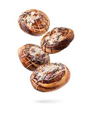 Sweet buns. Delicious rolls with almond falling on white background