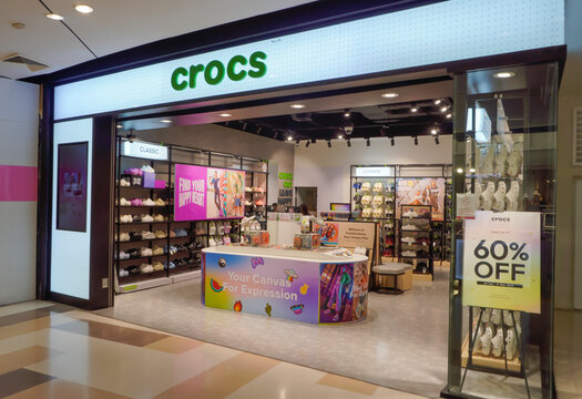 Bangkok, Thailand, March 20, 2024 Crocs, the shoe that breaks old rules and truly becomes the shoe of the century. With strange colors Inspired by traditional shoes There is a branch at Central Salaya