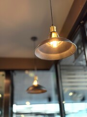 group of hanging lights with a shallow depth of field.	