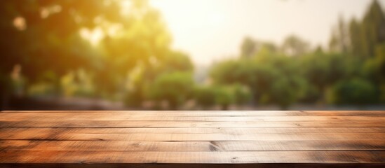 Naklejka na ściany i meble Wooden table empty with blurred background