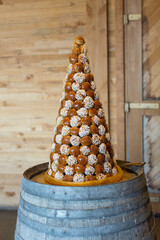 View of a tall croquembouche wedding cake - 758511794