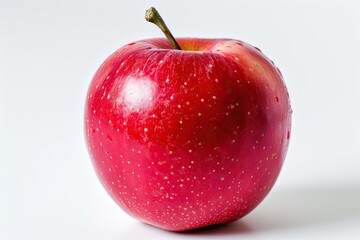 A perfectly centered ripe red apple on a bright