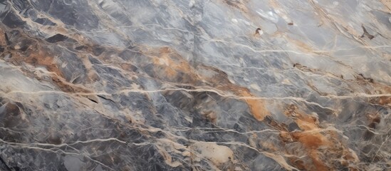 A detailed closeup of a marble surface with a textured pattern of gray and brown, resembling a natural landscape with elements like rocks and bedrock