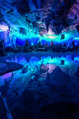 The Reed Flute Cave, natural limestone cave with multicolored lighting in Guilin