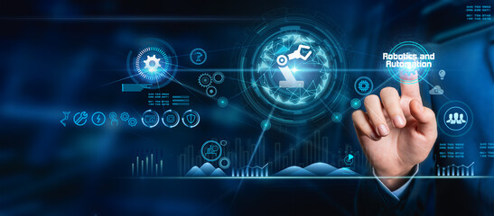Engineers check and control welding robotics automatic arms machines in intelligent factories in automotive and industrial industries with monitoring system software. Digital manufacturing operation.