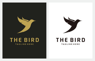 Flying Colibri Hummingbird gold logo design. Minimalist Bird symbol icon
