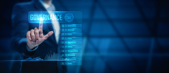 Business, Technology, the Internet, and network concepts. A young businessman shows the word on the virtual display of the future- Governance
