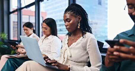 Laptop, typing and black woman employee in workshop or seminar for growth, training and...
