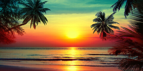 Sunset on tropical island sea beach panorama, ocean sunrise panoramic landscape, palm tree leaves silhouette, yellow sun reflection, blue water waves, colorful orange red sky, summer holiday, vacation