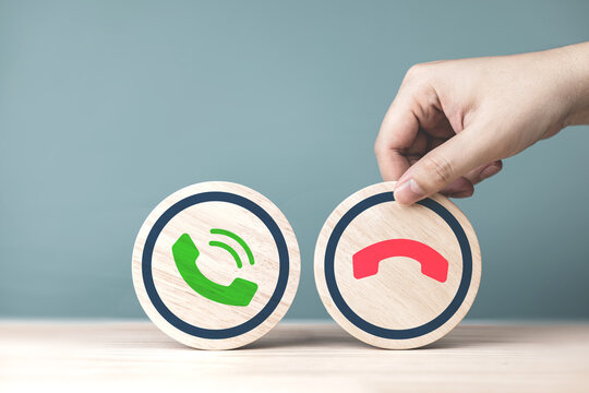 Incoming call telephone icon on circle of wood. Fraudsters steal personal information via telephone conversations, marketing to sell promotions on mobile phones