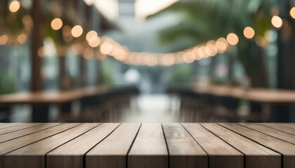 Empty wooden tabletop with lights bokeh on blur restaurant background - Powered by Adobe