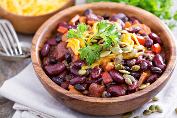Vegetarian chili with red and black beans - obrazy, fototapety, plakaty