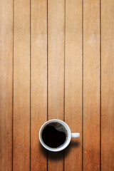 coffee cup on wooden table top view