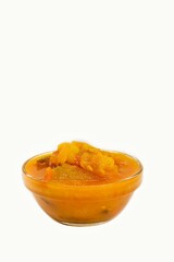Homemade Tomato Sauce or Tomato Chutney in a Glass Bowl Isolated on White Background with Copy Space