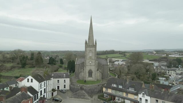 Clones town with historic church, county monaghan, ireland, overcast day, aerial view