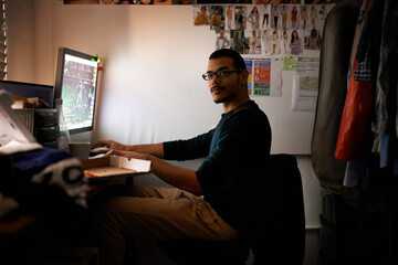 Portrait, computer and gamer man in bedroom of home for online multiplayer gaming at night....