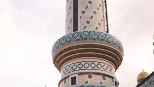 detailed islamic minaret with beautiful artwork at Jame' Asr Hassanil Bolkiah Mosque in Bandar Seri Bagawan in Brunei Darussalam