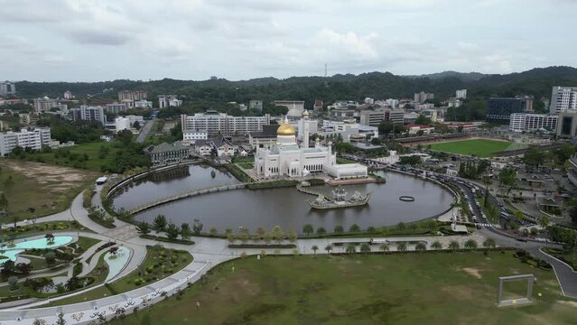 Aerial drone shot of Sultan Omar Ali Saifuddien Mosque complex in Bandar Seri Bagawan in Brunei Darussalam
