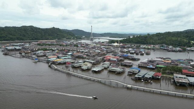 motor boat on the river heading out towards the floating villages of Kampong Ayer in Bandar Seri Bagawan in Brunei Darussalam

