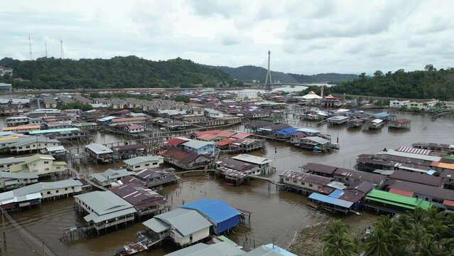 aerial drone shot of the floating villages of Kampong Ayer in Bandar Seri Bagawan in Brunei Darussalam
towards the famous bridge