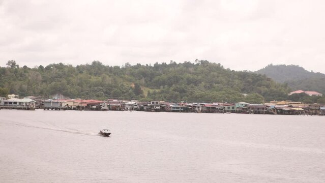looking out over the river towards the floating villages of Kampong Ayer in Bandar Seri Bagawan in Brunei Darussalam
