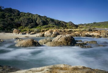 ocean and rocks in the mountains