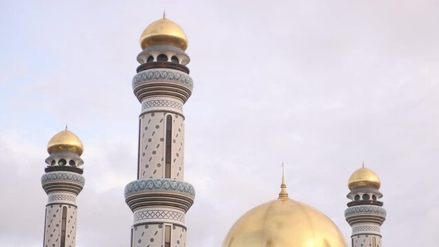 beautiful golden dome and towering minarets of Jame' Asr Hassanil Bolkiah Mosque in Bandar Seri Bagawan in Brunei Darussalam